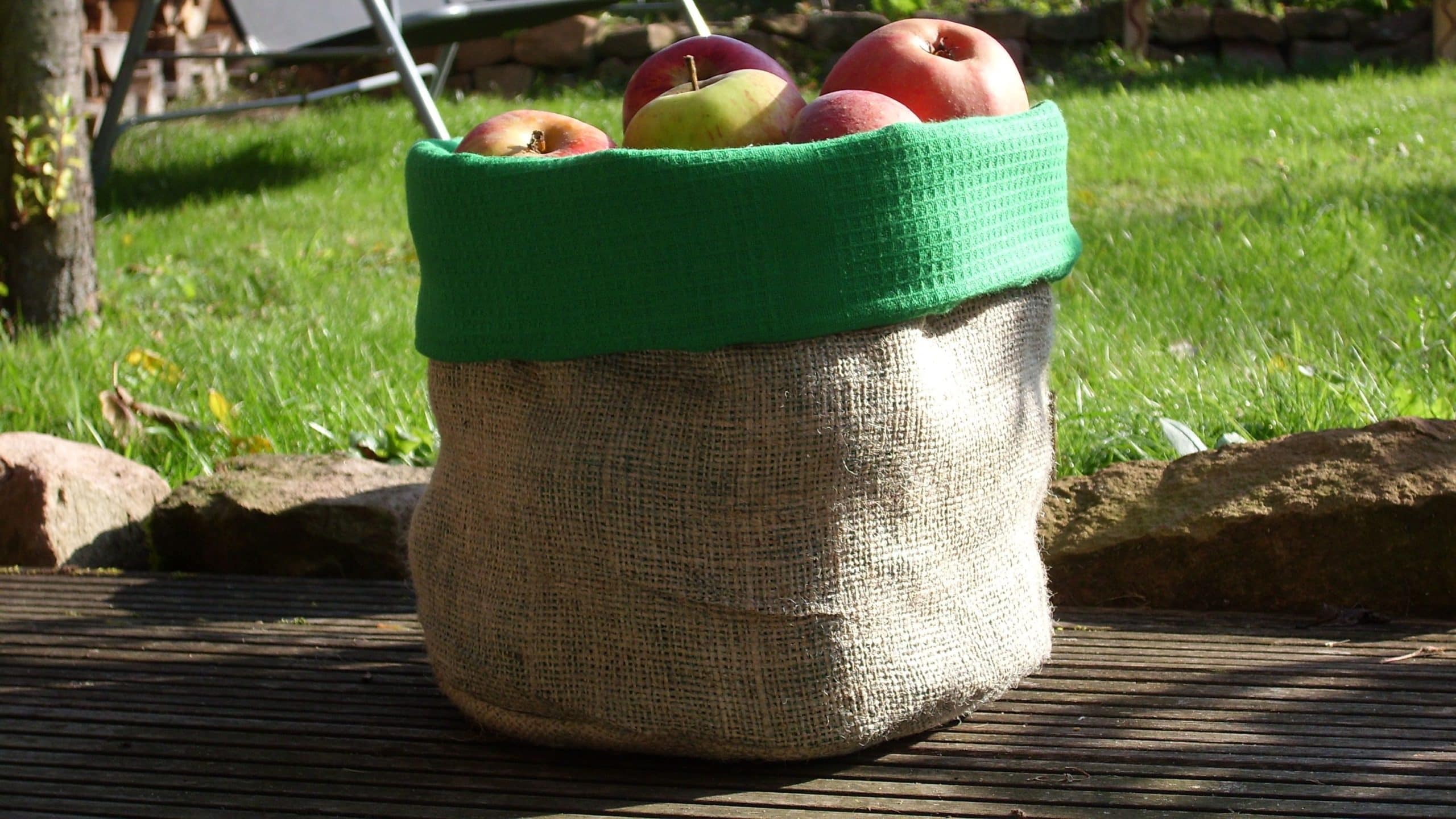 jute bag filled with apples